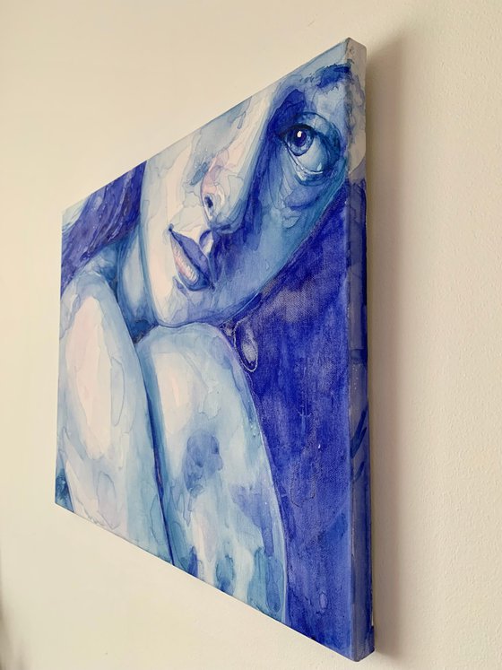 Young Woman in Calm Blue and Ultramarine Blue Colours