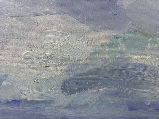 Clouds over the field and ditch