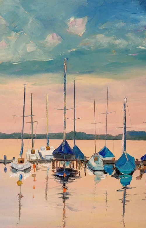 Sailing boats at the jetty. Sunset. by Kathrin Flöge