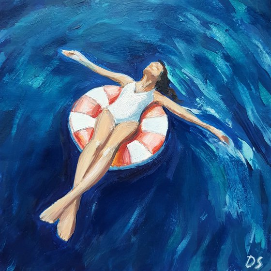Woman with the swim ring