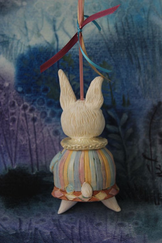 Little rabbit in harlequin dress. Hanging sculpture, bell doll by Elya Yalonetski