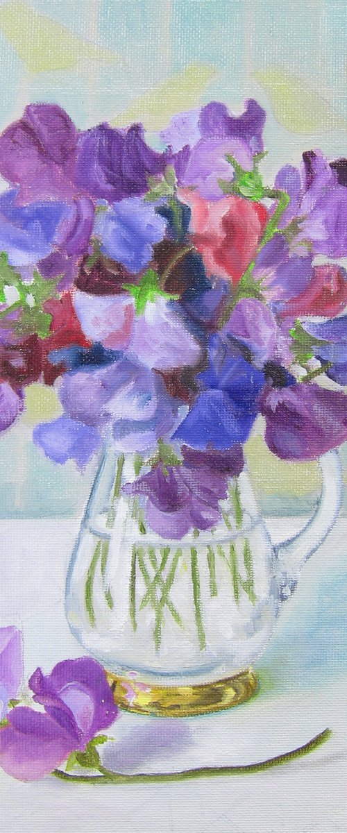 Sweet peas in glass jug by Sophie Colmer-Stocker