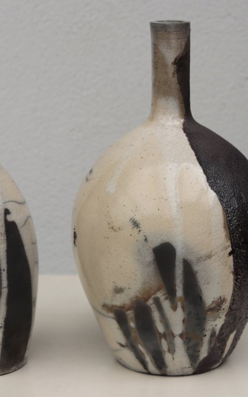 2 raku and black vessels by Koen Lybaert