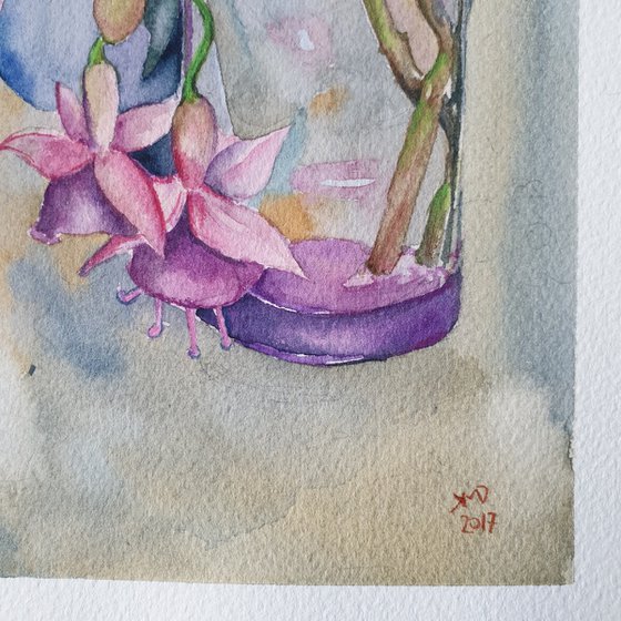 Fushia flowers on painter's table