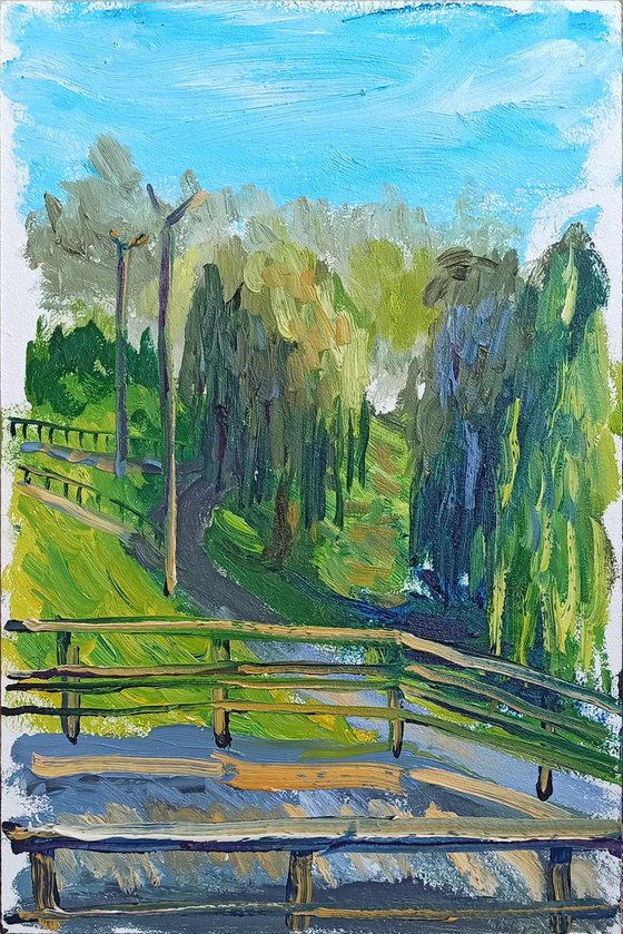 Weeping willows in the park. Pleinair painting