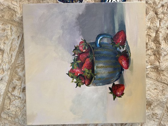 Still life with strawberry mug