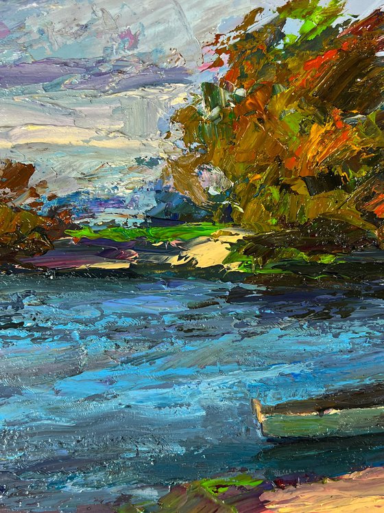 A Boat on the River Bank