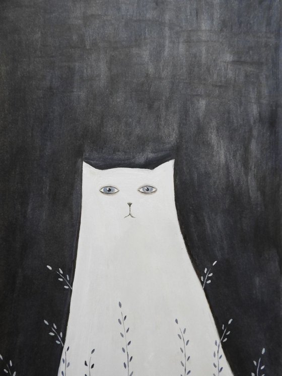 The white cat in the night