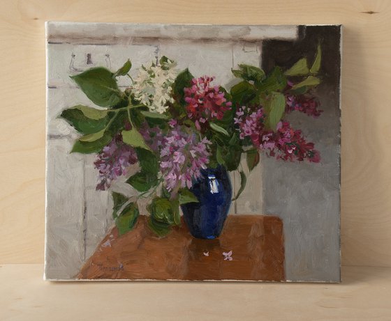 Lilac in a blue vase