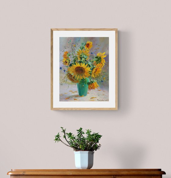Sunflowers in a green vase