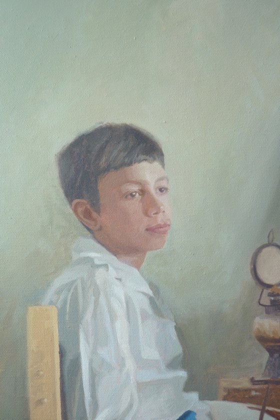 Boy infront a tripod