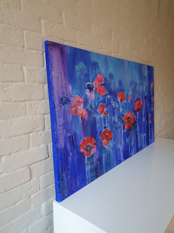 Poppies on blue