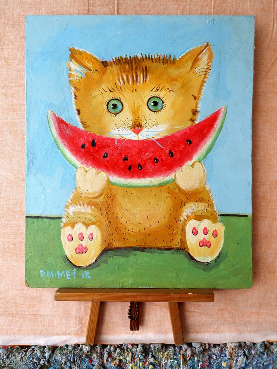 A CAT NAMED SLICE, AND A SLICE OF WATERMELON.