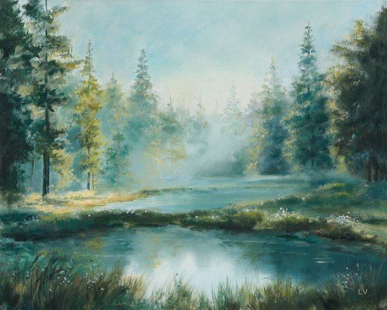 Misty lake in a pine forest