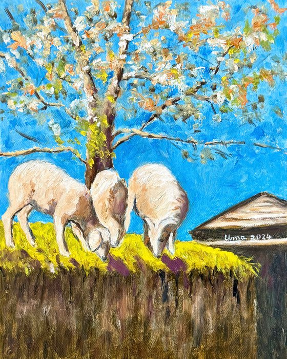 Sheep grazing under a tree