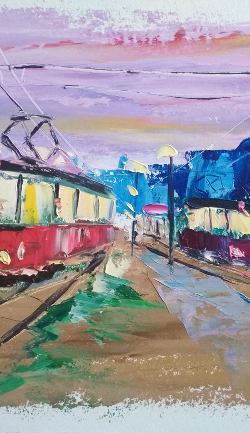 Streetcars in the evening city. Pleinair painting by Dmitry Fedorov