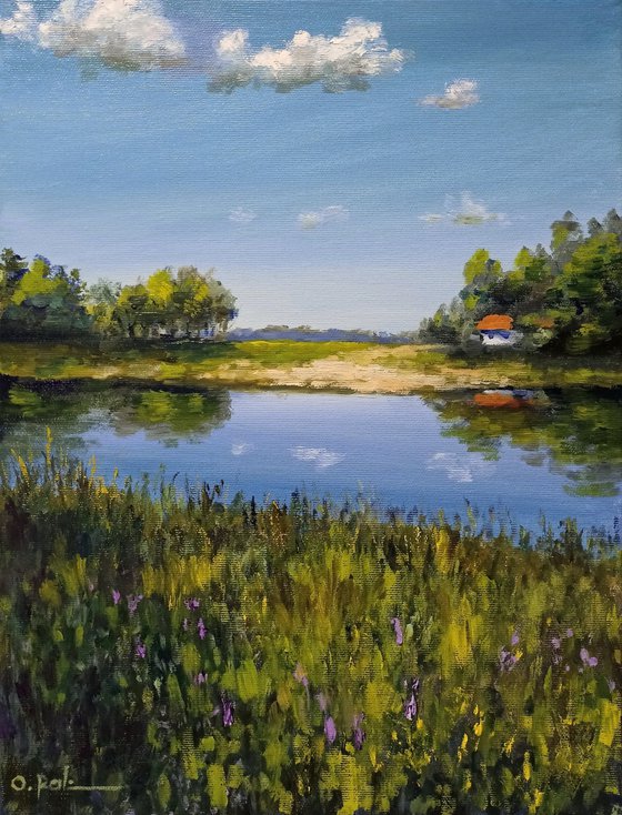 A farmstead by the river