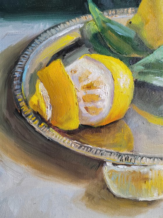 Lemon fruit slices on metal tray still life