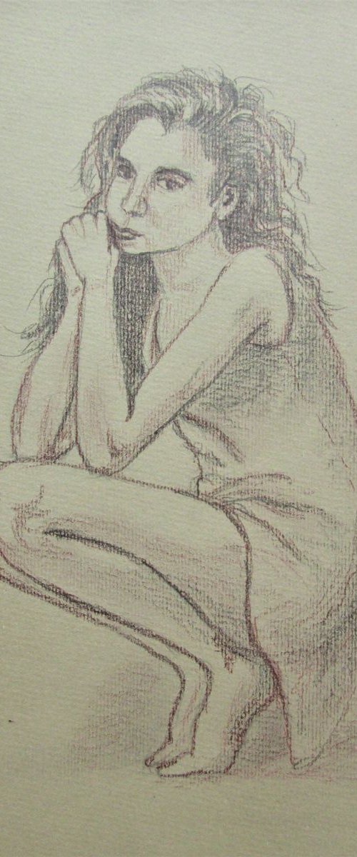 woman sitting by MARJANSART
