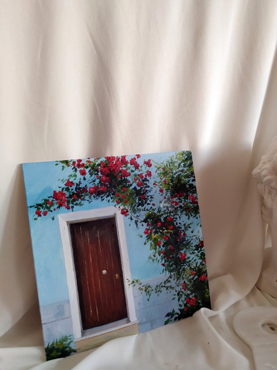 Roses on a blue wall