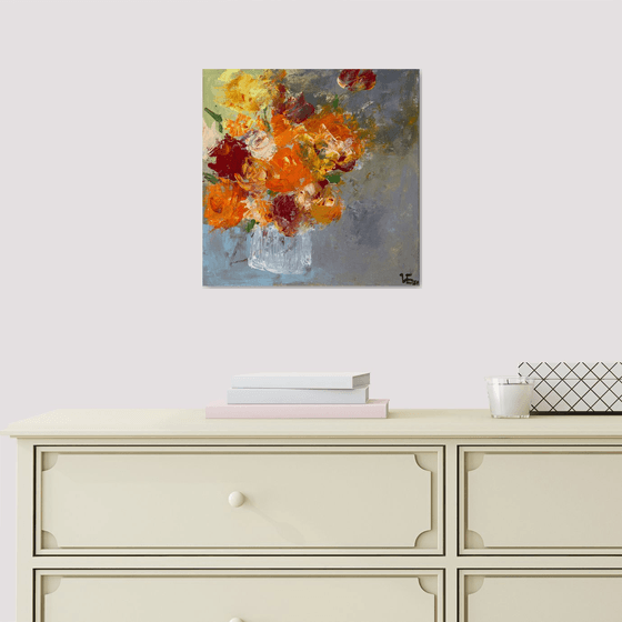 Small still life with orange and burgundy roses