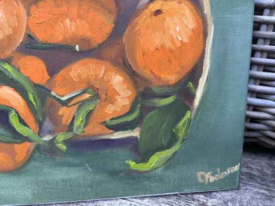 Tangerines in a wooden basket