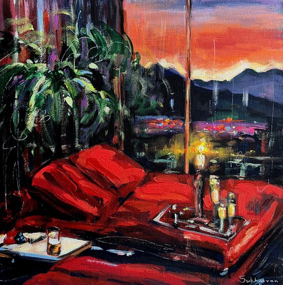 Interior with Red Couch, Candles and Champagne. Los Angeles Cityscape