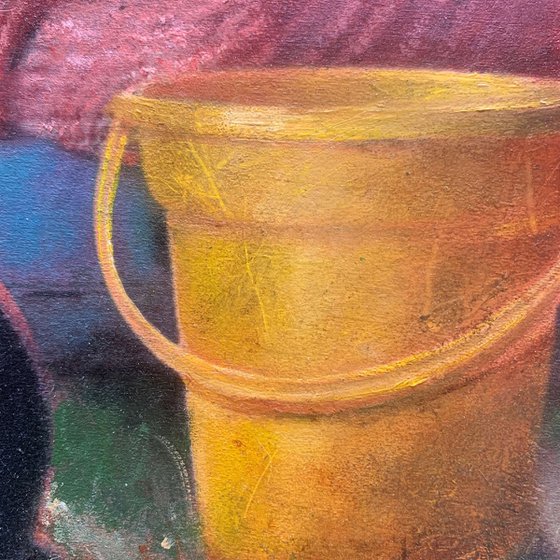 Girl with the yellow bucket