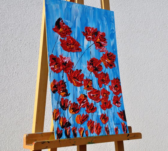 Poppies On Blue