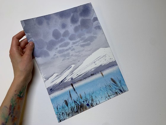 BLUE LAKE IN THE MOUNTAINS