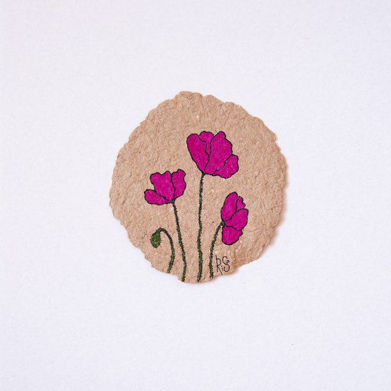 Magenta poppies drawing on the author's craft paper