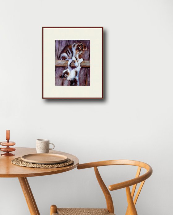 Playful Kittens on the Fence