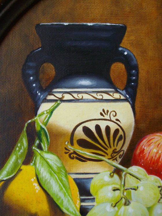 Greek amphora with fruits on lace