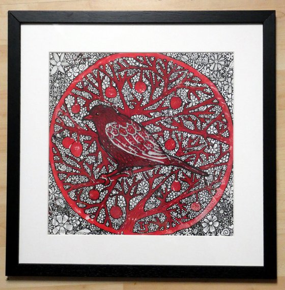 Red bird with berries