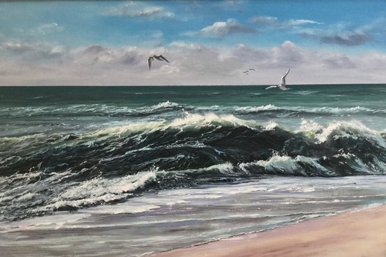 Gulls over waves