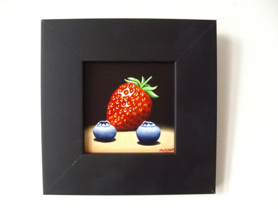 Still life with strawberry and blueberries