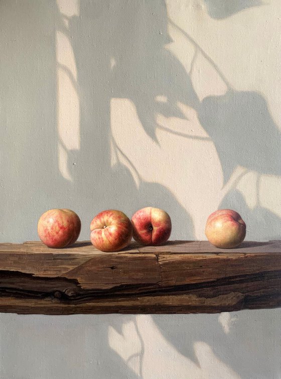 Still life:peaches on the wooden table