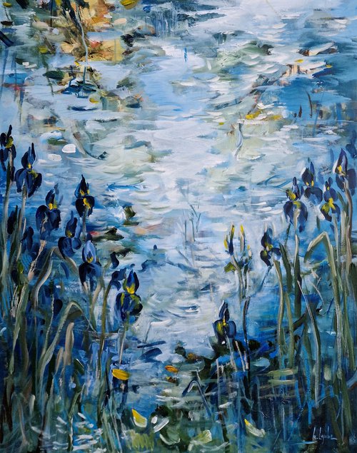 Blue irises at the blue pond by Irina Laube