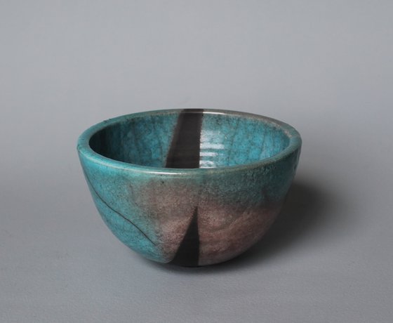 Raku Bowl with a smoked black stripe.