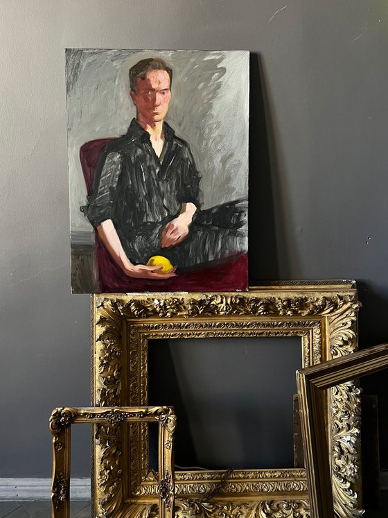 Portrait of a man with lemon