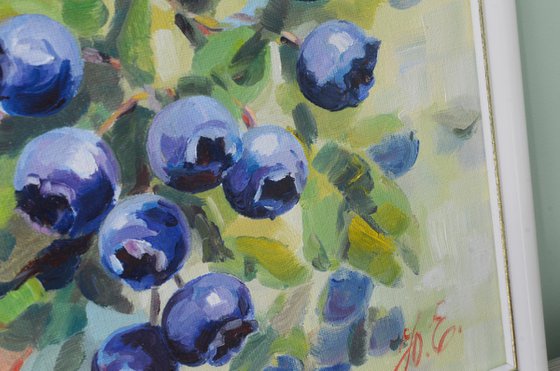 Blueberries on green