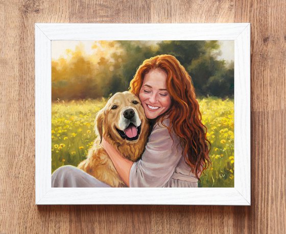 Smiling red-haired woman hugging a dog