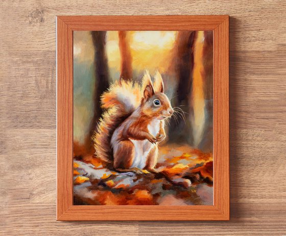 Red squirrel in autumn forest