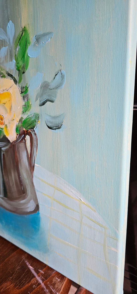 Blooming yellow roses on blue