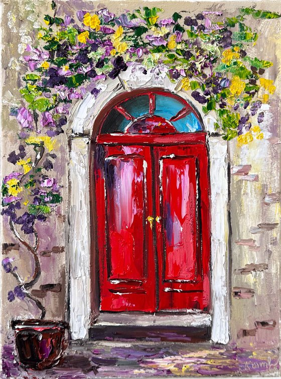 Red door with flowers