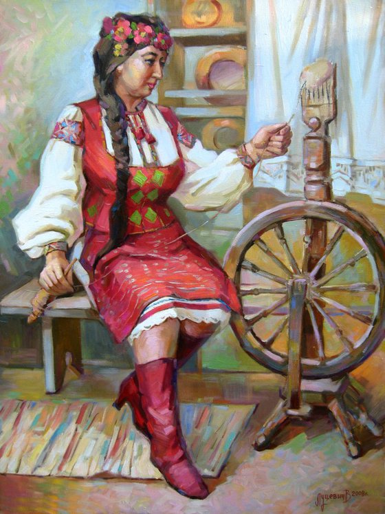 The girl at the spinning wheel. Portrait Ukrainka