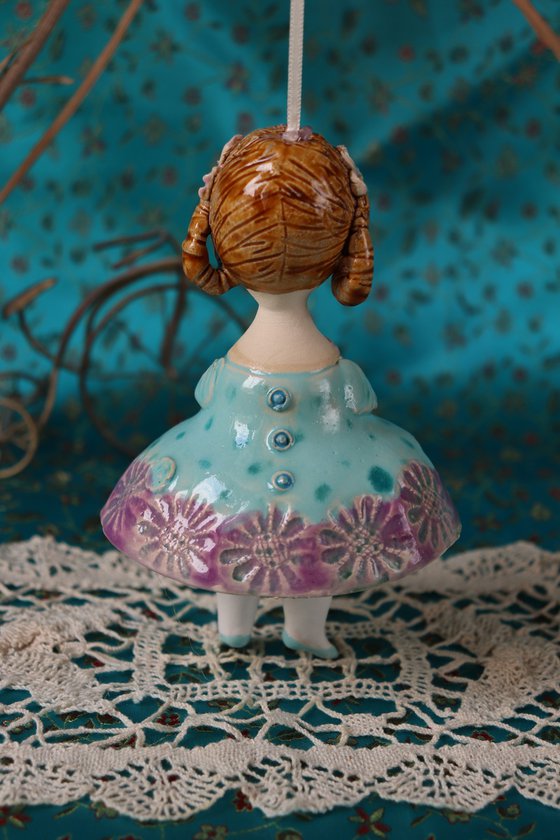 Little Girl in Mint Blue Dress. Tiny hanging sculpture