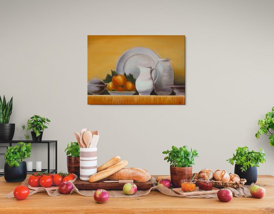 Still life with fruits and kitchen utensils