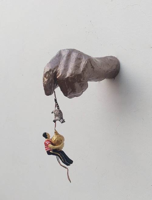 Hand holding acorn by Shweta  Mahajan