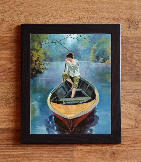 Young man on a river boat